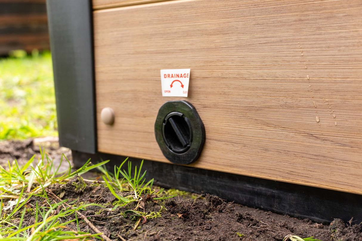 Modern drainage system on Breeze Ice Bath with Current, featuring wood panel exterior and black drain valve - Passion Ice Baths Collection