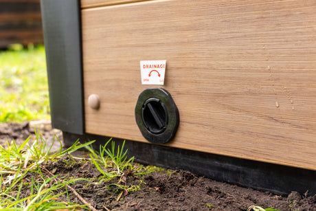 Modern drainage system on Breeze Ice Bath with Current, featuring wood panel exterior and black drain valve - Passion Ice Baths Collection