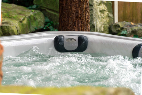 Elevate ice bath with powerful jets creating dynamic water movement in outdoor setting - Ice baths by Passion Ice Baths