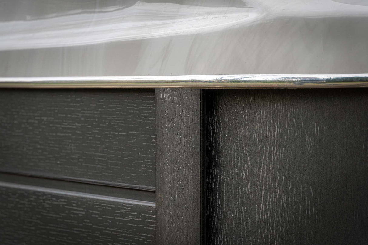 Close-up detail of Elevate ice bath's premium textured exterior panel with metallic trim - by Passion Ice Baths