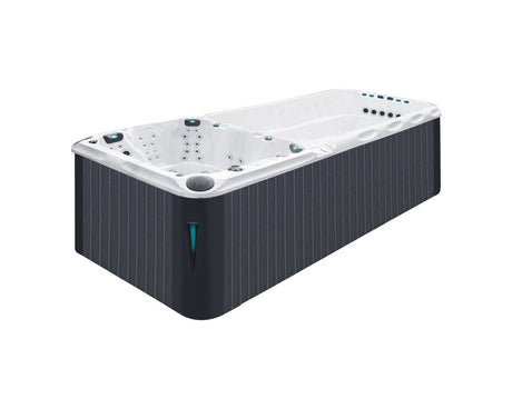 Dynamic swim spa with white shell and dark gray cabinet, featuring dual-zone design for swimming and hydrotherapy - Passion Spas Sport Collection