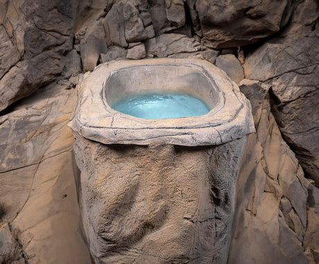 Faith rock-inspired ice bath with blue water in stone-textured design, showcasing natural aesthetics - Passion Ice Baths Collection