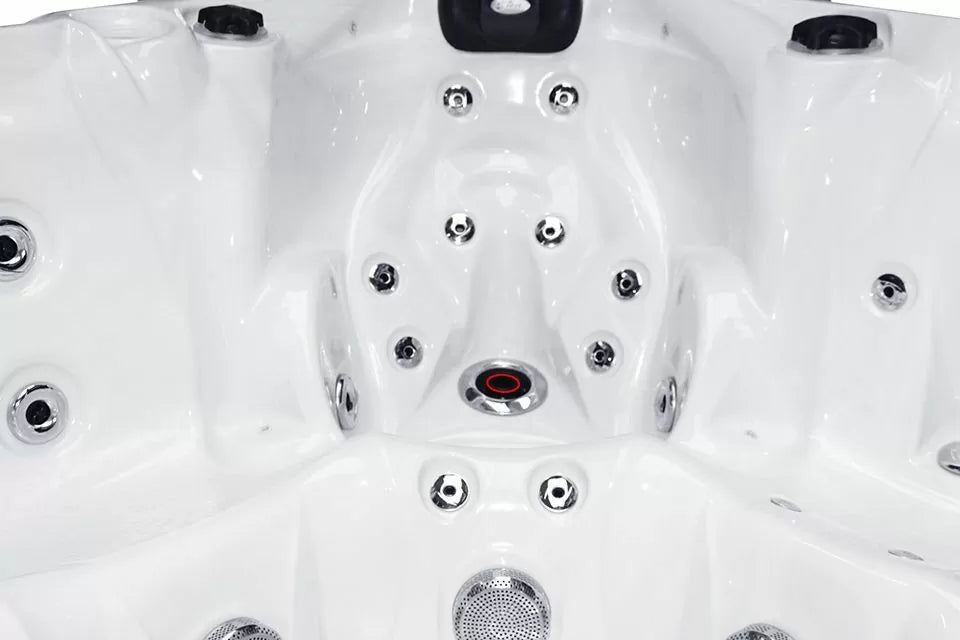 Interior view of Admire spa showing therapeutic jet configuration in white shell with chrome jets and built-in audio - Passion Spas Signature Collection