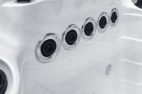Close-up view of river swim system jets in Activity 2 Deep swimspa, featuring 5 aligned chrome jets - Passion Spas Swim Spas Sport Collection