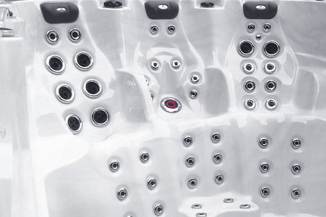 Interior view of Activity 2 Deep swim spa showing hydrotherapy jet configuration with chrome jets in white shell - Passion Spas Swim Spa