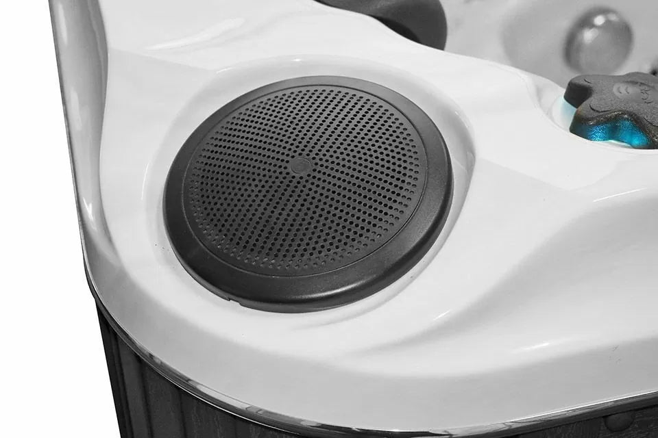Round black integrated speaker on white hot tub shell detail - Pleasure spa by Passion Spas Signature Collection Hot Tubs