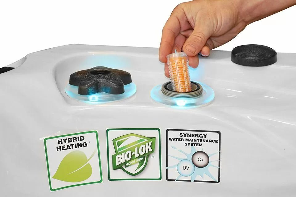 Pleasure hot tub control panel with blue LED lighting, showing hybrid heating and Bio-Lok system features - Passion Spas Signature Collection